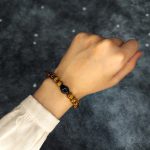 دستبند سنگ چشم ببر و عقیق سیاه