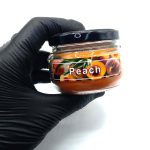 550053 شمع معطر شیشه ای درب فلزی پارمیس مدل هلو ( پچ )