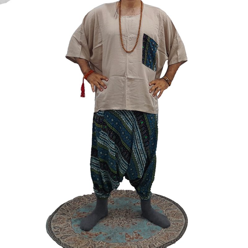 ست شلوار تبتی طرحدار سبز و پانچو کرمی